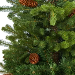 3.5’ Yukon Mountain Fir Artificial Christmas Tree With 50 Clear Lights And Pine Cones In White Planter -Cheap Artificial Trees Store artificial 35 yukon mountain fir artificial christmas tree with 50 clear lights and pine cones in white planter nearly natural 424677