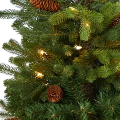 3.5’ Yukon Mountain Fir Artificial Christmas Tree With 50 Clear Lights And Pine Cones In White Planter -Cheap Artificial Trees Store artificial 35 yukon mountain fir artificial christmas tree with 50 clear lights and pine cones in white planter nearly natural 590391