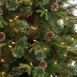 9’ Snowed Tipped Clermont Pine Artificial Christmas Tree -Cheap Artificial Trees Store artificial 9 snowed tipped clermont mixed pine tree with 900 clear lights pine cones and 900 branches nearly natural 896111